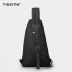 Back view of a black crossbody bag with model T-S8060