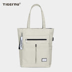 Mochila deportiva informal Tigernu T-S8632, resistente al agua, con carga USB, para portátil, para niñas y mujeres